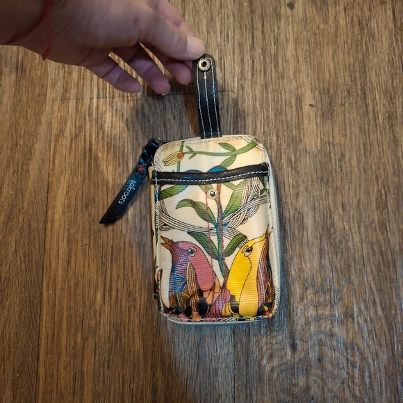 The Sakroots Peace Crossbody Wallet. - Picture 14 of 15